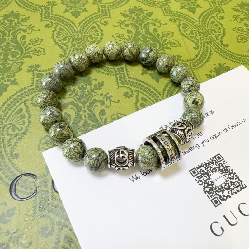 G*u*i bracelets